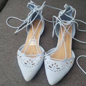 Soft baby blue flats with ankle tie laces